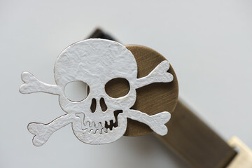 skull and crossbones on a metal object