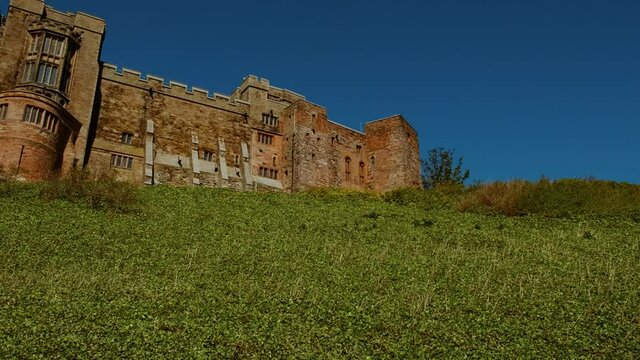 Wide view of Bamburgh Castle, dating to 11th century and the seat of the former Kings of Northumbria, Northumberland, England, UK