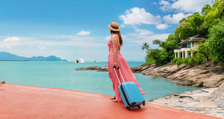 Day dream traveler woman with suitcase joy nature panorama sea view scenic landscape, Attractive...