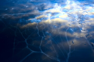 cracked ice texture, abstract seasonal winter cold background, natural ice, broken ice on a lake