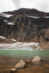 Glacier with lake in front of mountain in Jasper National Park, Canada