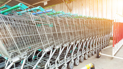 Shopping carts piled in line for customers to pick up