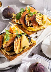sandwich with red fish, grilled zucchini, healthy breakfast