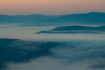 Fototapeta na wymiar sunrise landscape with fog in the mountains
