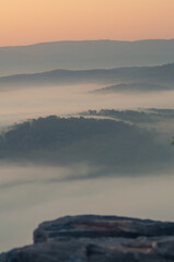 sunrise landscape with fog in the mountains