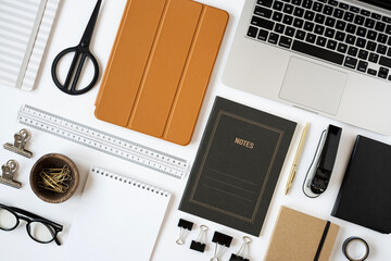 Aesthetic minimalist home office desk workspace on white background. Notebook, laptop computer,...