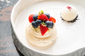 Pavlova meringue cake with berries
