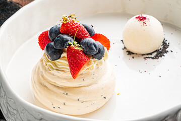 Pavlova meringue cake with berries