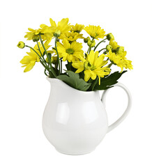Yellow chrysanthemum flowers in a white ceramic jar with yellow satin ribbbon bow isolated on white