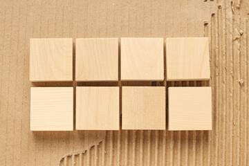 four wooden cubes in two rows with space for text