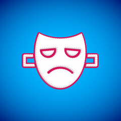 White Drama theatrical mask icon isolated on blue background. Vector