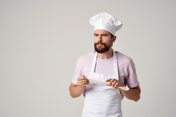 bearded man chef with a white cap on his head emotions work