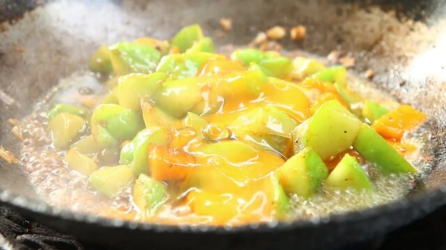 Frying chayote and pumpkin with egg in pan, in door  Chiangmai  Thailand