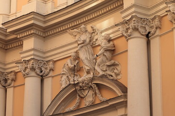 Fototapeta na wymiar Santissima Trinità degli Spagnoli Church Facade Detail with Statues and Columns in Rome, Italy