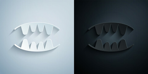 Paper cut Vampire teeth icon isolated on grey and black background. Happy Halloween party. Paper art style. Vector