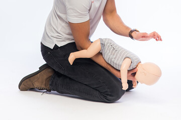 Demonstration of first aid on a baby dummy. 