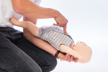 Demonstration of first aid on a baby dummy. 