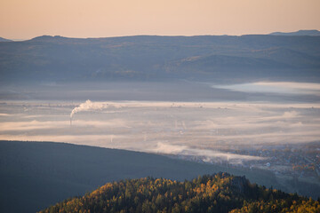 landscape with fog town in mountains