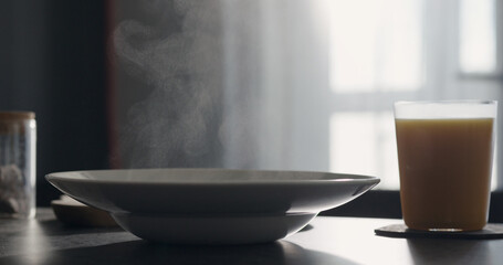 steam rising from penne pasta