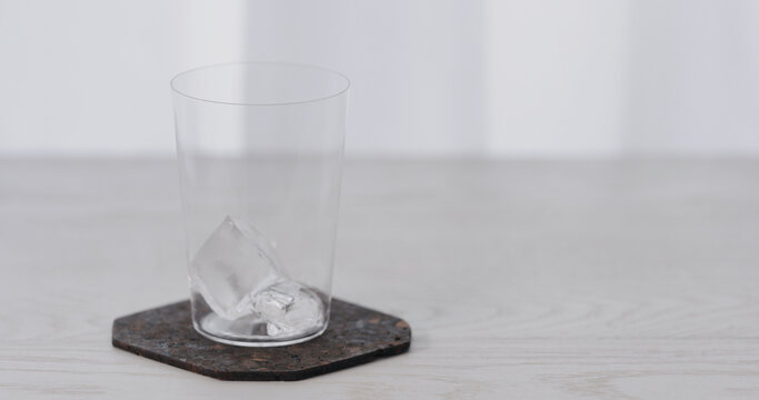 Big Ice Rock Into Tumbler Glass