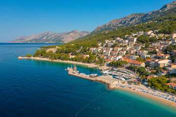 Aerial view of Gradac town below Biokovo mountain, the Adriatic Sea, Croatia