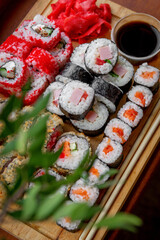 Sushi roll set on a wooden board