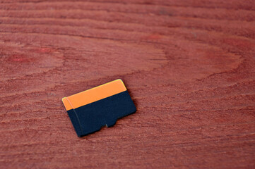 flash memory micro SD card on a wooden board