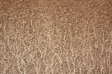 Pattern of the dried clay texture on wall , Close-up