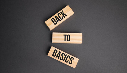 back to basics word written on wood block. objective text on table, concept.