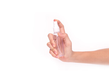 Hand with ethyl alcohol bottle going to apply spraying for disinfection, clean up and washing hand, isolated on white background.