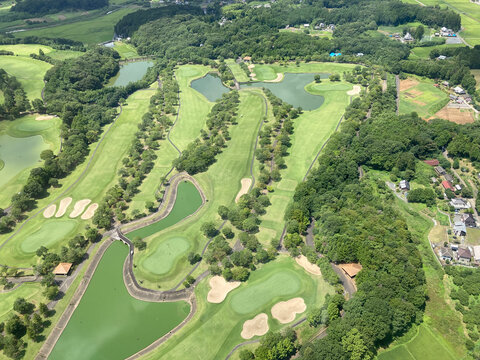 View of a Golf Course in the Countryside from Helicopter