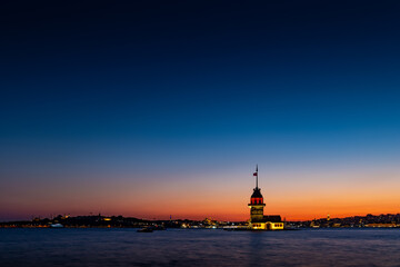 Fototapeta na wymiar Evening over Bosphorus with famous Maiden's Tower. Istanbul, Turkey