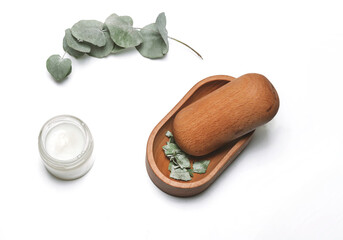 eco-friendly face and body care products with coconut oil, eucalyptus.on a white background