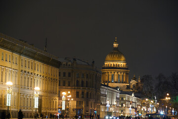 Fototapeta na wymiar St. Isaac's Cathedral illuminated on a winter evening in St. Petersburg