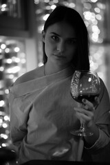 The girl in the evening in a cafe