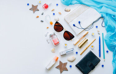 Outfit of young woman or modern teenager girl on white background - cosmetic and lifestyle accessories. Flat lay objects.