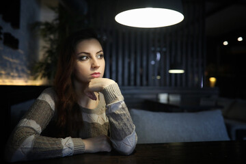 Beautiful girl in a cafe
