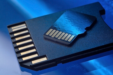 micro sd flash drive and adapter for it close-up.