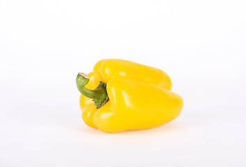 Yellow bell peppers isolated on white background.