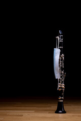 An Eb clarinet with a medical mask on, to represent restrictions on concerts and culture during a...
