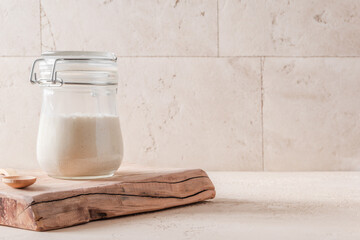 Wheat sourdough starter. Horizontal orientation. Copy space.