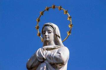 Monument to the Mother of God with a halo in the park