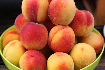 Peaches close up on the local farm market, eco juicy fruits. Shopping organic products. Healthy grocery. Summer autumn season market