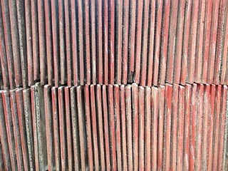 neatly arranged pile of tiles