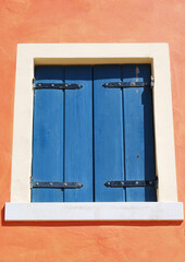 old window with shutters