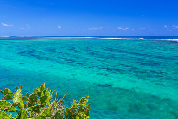 Beautiful landscape of the sea and coral reef. Blue Indian Ocean on the island of Mauritius.