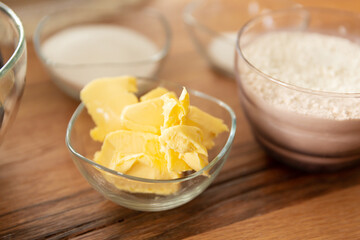 Home cooking baking plum cake with ingredients on wooden table, top view