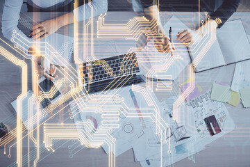 Double exposure of woman hands working on computer and tech theme hologram drawing. Top View. Technology concept.