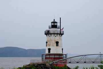 Fototapeta na wymiar The Tarrytown Lighthouse abandoned and empty on the Hudson River in New York State