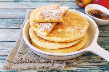 French cuisine. Matefaim. Sweet Apple Pancakes, powdered sugar dressing